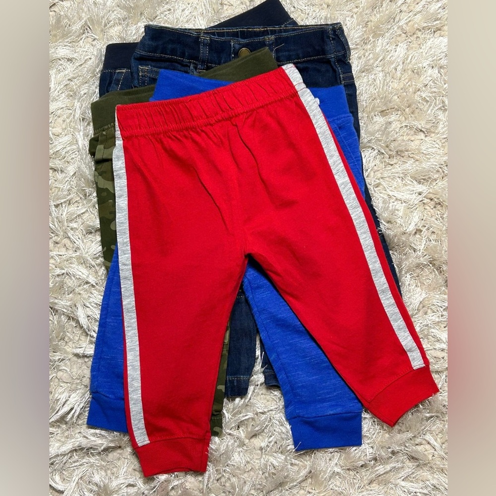 5 Garanimals pants. Size 12 months